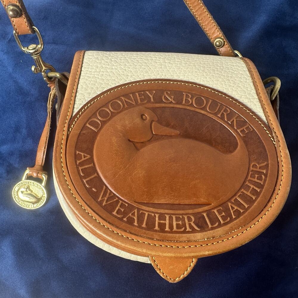 Dooney & Bourke Big Duck Bag Vintage All Weather Cream with Tan & charm